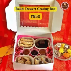 The Rakhi Dessert Grazing Box is a modern twist on festive gifting. It’s a curated assortment of sweet and savoury bites, including mini cupcakes, cookies, brownies, and dips, perfect for sharing and celebrating the sibling bond.
