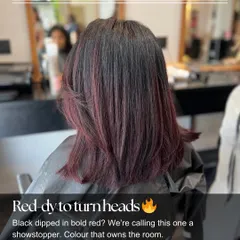 Ready to turn heads. Black hair dipped in bold red is a showstopper. This is color that owns the room.
