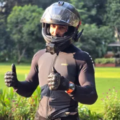 Thumbs up for safety. A full set of gear, including helmet and gloves, is mandatory for anyone joining my rides. No compromises.