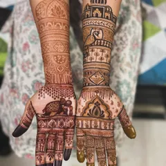 This destination wedding mehendi was so much fun to create. I incorporated elements like an elephant on the palm and a beautiful monument on the forearm to match the couple's story and wedding theme.