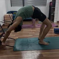 Using a chair for support is a fantastic way to build confidence and proper form in Chakrasana (Wheel Pose).