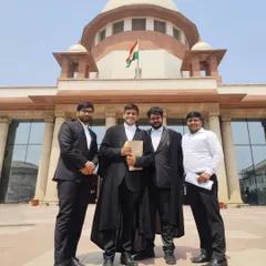 Celebrating a successful outcome with my team outside the Supreme Court. Every victory is a team effort, built on rigorous preparation and collaborative strategy.