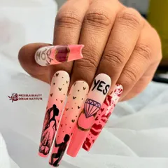 The perfect "I do" accessory. This custom bridal set tells a love story with hand-painted silhouettes, a sparkling diamond design, and the all-important "YES" on extra-long coffin nails.
