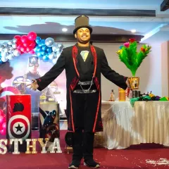 Ta-da. A bouquet of flowers appears from an empty box. This classic illusion is always a hit at birthday parties, bringing smiles to everyone's faces.