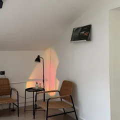The cozy waiting area in our studio. I want you to feel at home from the moment you walk in.