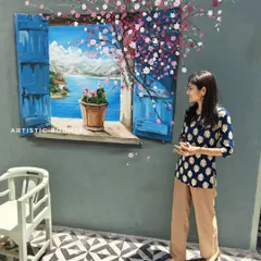 This 3D window mural was created for a cafe to give the feeling of looking out onto a beautiful view. I teach this trompe l'oeil technique to create depth and illusion in my mural course.