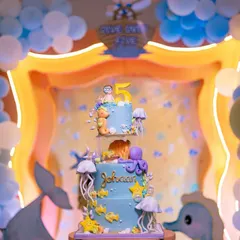 The cake is the centerpiece of any birthday. This stunning, multi-tiered 'Under the Sea' cake was as much a part of the decor as it was a delicious treat.