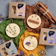 What are beeswax sachets? They are solid wax tablets that encapsulate botanicals and fragrance, acting as a beautiful, natural air freshener for small spaces.