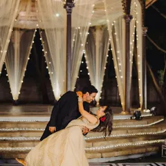 A romantic dance under the stars and fairy lights. I work to create the perfect ambiance for your first dance and evening celebrations.