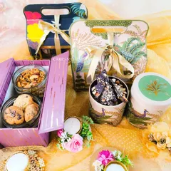I believe the packaging should be as delightful as the treats inside. My Diwali hampers come in various styles, including elegant gift bags and boxes, filled with items like chocolate almond bark, assorted cookies, and flavored nuts.