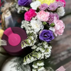 The beautiful, multi-colored floral arrangement that brings a touch of nature's healing energy to the gift.