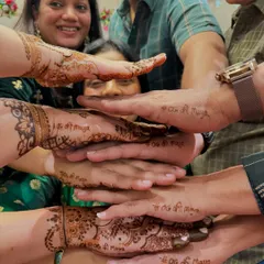 A fun family moment. I wrote the wedding hashtag on everyone's hands, from the groom to his parents, bringing everyone together for the celebration.