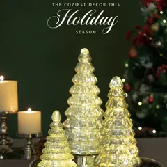 The coziest decor this holiday season. My glass LED Christmas trees are a stunning centerpiece, creating a warm and magical glow for your festive gatherings.