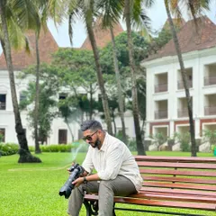 Taking a moment between shoots to review my work. Every detail matters.