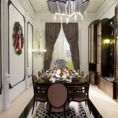 Experience timeless elegance in this classical dining room. The use of wood, a grounding element, and a rectangular table, which promotes communication, creates an unforgettable ambiance for family meals and celebrations.