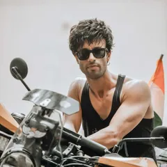 This is a portrait from a recent biker community ride in Jim Corbett, showcasing a different side of my lifestyle photography. I aimed to capture the rider's cool demeanor and the adventurous spirit of the event, using a shallow depth of field to make the subject stand out. It's about telling the story of a person's passion.