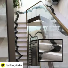 The staircase is often the spine of a home, and I wanted this one to be a dramatic centerpiece. We used bookmatched Panda marble, meticulously ensuring the natural veins flow seamlessly from the ground floor to the top. It’s a bold architectural statement that showcases the beauty of natural stone.
