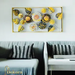 This rectangular framed piece features an abstract arrangement of flowers and leaves in a striking yellow, black, and white color palette. It's a modern interpretation of a classic floral theme.