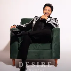 The look of a man who owns his presence. This shot captures the confident and charismatic energy my clothes are designed to inspire. The detailed jacket is the centerpiece of a powerful, modern look.