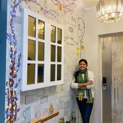 Art can transform a house into a home. For this residential entryway, I painted a French-themed mural with delicate floral branches to create a warm and elegant welcome, seamlessly blending with the home's interior design.
