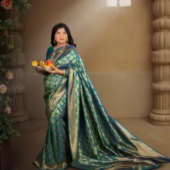There is a timeless elegance to a maternity photoshoot in a traditional saree. Here, we used a rich teal silk saree and classic studio lighting to create a regal and graceful portrait of the mother-to-be.