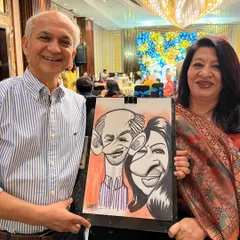 A lovely couple with their caricature from an event at the Sheraton. A great memory from a special evening.