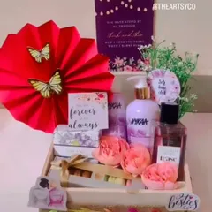 A gift from the bride to her besties. This hamper, set in a wooden tray, includes Nykaa beauty products, a "forever always" card, and other treats to thank her bridesmaids.