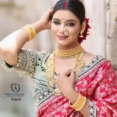 A close-up of the model in the pink Navvari saree, highlighting the beautiful makeup and intricate jewellery.