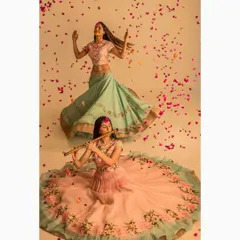 A creative fashion shoot for an ethnic wear designer, using props like a flute and falling petals to build a poetic and dreamlike mood. This image demonstrates my conceptual approach to making garments part of a larger visual narrative.