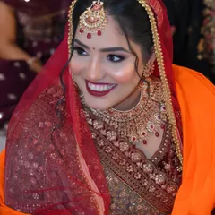 A radiant smile from one of my 2024 Sikh brides. Her look features a classic bold lip and defined eyes, a timeless combination that ensures she stands out with grace and confidence.