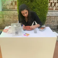 Here I am at a corporate event for Godawan Single Malt, doing live engraving on terracotta plates. Offering on-site personalization is a fantastic way to engage guests and provide a memorable takeaway.