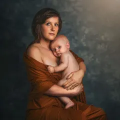 This painterly portrait of a mother nursing her baby is a tribute to the beautiful, intimate bond of early motherhood. It's a quiet, powerful moment that I was honored to document.