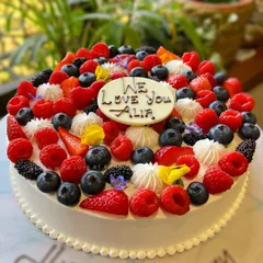 I was so honored to create this L'eto-inspired milk cake for Alia Bhatt's birthday. It's layered with my signature white chocolate mousse and topped with fresh summer berries and edible flowers.