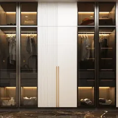 A modern wardrobe solution featuring a mix of white fluted panels and smoked glass doors. The interior lighting showcases the organized space within, blending high-end aesthetics with practical design.