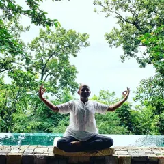 Here I am in a moment of quiet reflection in the Himalayas, practicing Jnana Mudra to open myself to knowledge and inner peace. I believe the environment we practice in becomes part of the practice itself, and the energy of these mountains is profoundly clarifying.