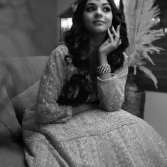 A timeless black and white portrait from an ethnic wear shoot. Stripping away the color focuses the viewer's attention on the model's expression, the texture of the fabric, and the play of light.