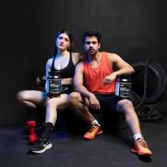 A key shot for e-commerce, featuring both male and female models presenting the whey protein supplements directly to the camera. This composition is effective for building trust and is ideal for landing pages or Amazon A+ content, clearly displaying the product in a relatable fitness context.