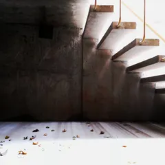 A quiet moment where light itself becomes a material. Sunlight streams across the floor at the base of a concrete staircase, illuminating fallen leaves and creating a poetic, transient scene.