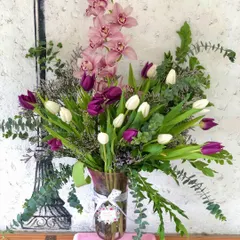 Another angle of this lush arrangement, showing how the different flowers and greenery come together. I focus on creating bouquets that look beautiful from every viewpoint.