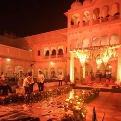 Destination weddings are our specialty. Here is a glimpse of a royal wedding setup at a palace in Rajasthan, illuminated for a grand evening ceremony. We transform magnificent venues into personal, unforgettable experiences.
