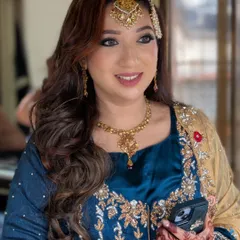 A smiling shot of my client, her eyes sparkling with the full glam makeup that was designed to last all night through the celebrations.