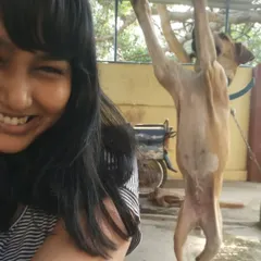 This is me with Puppy, a street dog I've known since he was three months old. His journey has been full of ups and downs, but his resilient and loving spirit is a testament to the incredible nature of our Indies.