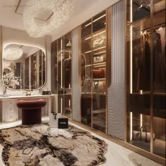 Our custom storage solutions combine elegance with practicality. This walk-in closet is designed for the private joys of dressing up, featuring mirrored and glass-fronted wardrobes with integrated lighting to display bags and accessories. A central vanity and plush seating create a functional and luxurious personal space.