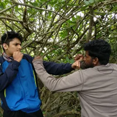 Training should also be fun. Here is a playful stare down before a light sparring session outdoors. While we take the craft seriously, creating a positive and enjoyable environment is key to staying consistent and motivated on your fitness journey.