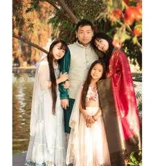Family stories are beautiful in every culture. It was an honor to capture this family, who embraced Indian traditions with so much love, during a sun-kissed outdoor portrait session in Delhi.