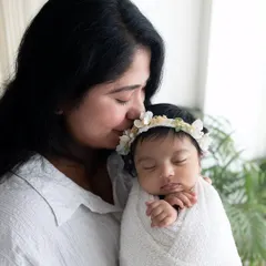 A tender moment between mother and baby. These lifestyle shots, with soft, natural light, are timeless treasures.