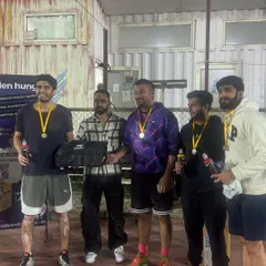 The runners-up, team Shooting Dragons, celebrating their performance. In our leagues, every team is guaranteed more than one match, ensuring plenty of court time.