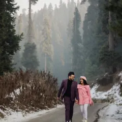 A quiet walk through a snow-dusted road in the mountains. We focus on capturing the feeling of being together in a vast, beautiful landscape, making these pre-wedding photos in Kashmir feel both epic and intimate.