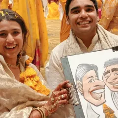 Nothing makes a wedding celebration more memorable than unique entertainment. Here's a happy couple at their Hyatt haldi function with a fun caricature to remember their special day. I love adding a touch of artistic fun to wedding festivities.