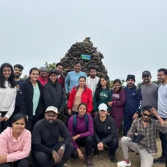 A large group photo at the Kumaraparvatha peak, showing the diverse mix of people who join my treks.